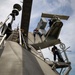 USS Sioux City Sailors Conducts Maintenance on the Ship's Mast