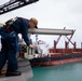 USS Sioux City Sailor Conducts Maintenance on the Ship's Radar