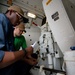 USS Sioux City and HSC 22 Sailors Conduct Maintenance on 57mm MK 110 Gun