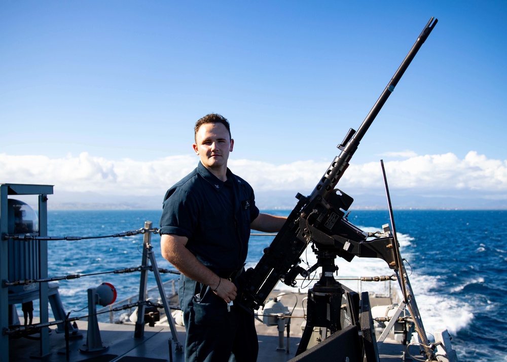 USS Sioux City Sailor Mans .50 Caliber Machine Gun After Departing Ponce, Puerto Rico