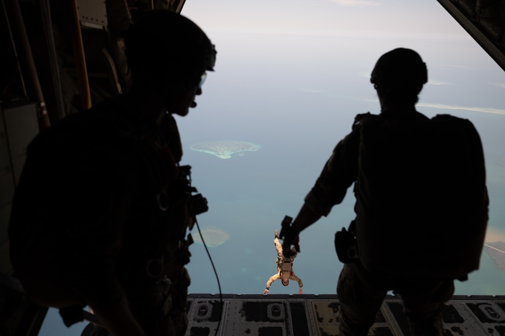 U.S. Air Force Pararescue Airmen and U.S. Navy Explosive Ordnance Disposal members Jump in East Africa