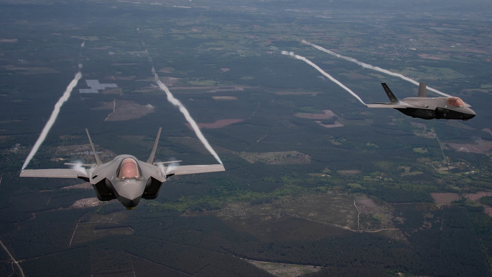 U.S. Air Force F-35As and French Rafales perform formation flight over France