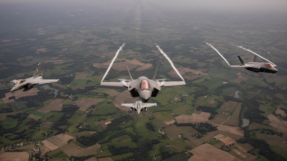 U.S. Air Force F-35As and French Rafales perform formation flight over France