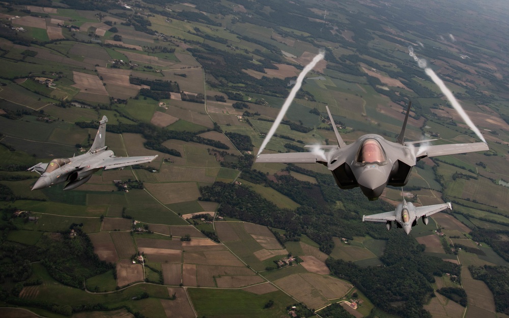 U.S. Air Force F-35As and French Rafales perform formation flight over France