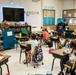 Airmen share financial freedom advice with elementary students