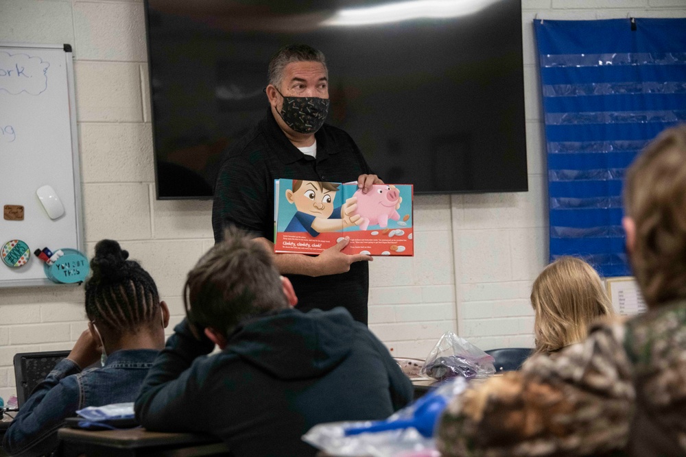 Airmen share financial freedom advice with elementary students