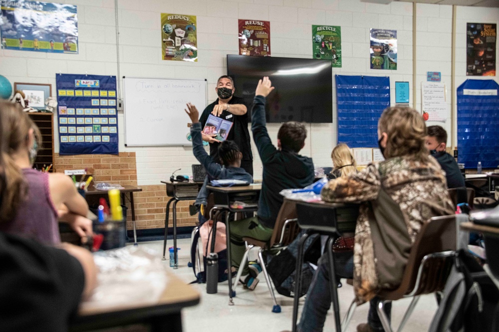 Airmen share financial freedom advice with elementary students