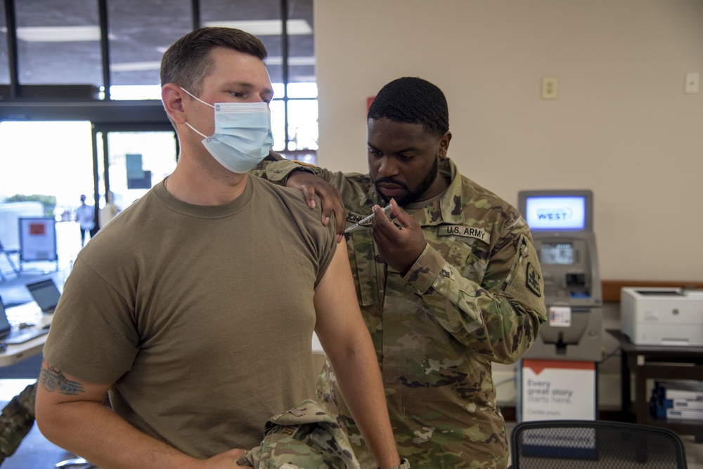 AZNG assists active component with vaccinations of service members and dependents