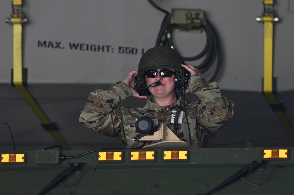 Mobility Guardian 21: 701st AS, 1-182nd FA Regiment load HIMARS onto Globemaster III