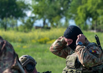 U.S. Air Force Special Operations Forces train with Romanian DCSL during a military free fall exercise.