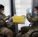 Soldiers of Task Force Phoenix receive their vaccine shots at Camp Buehring, Kuwait