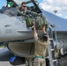 555th FS Airmen perform operations on AK21 F-16s