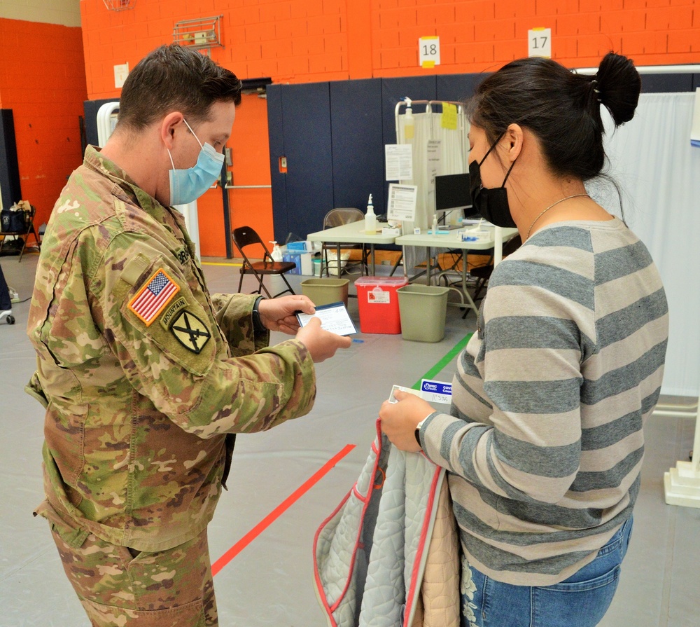 NY Guard members man vax site at Orange County Community College