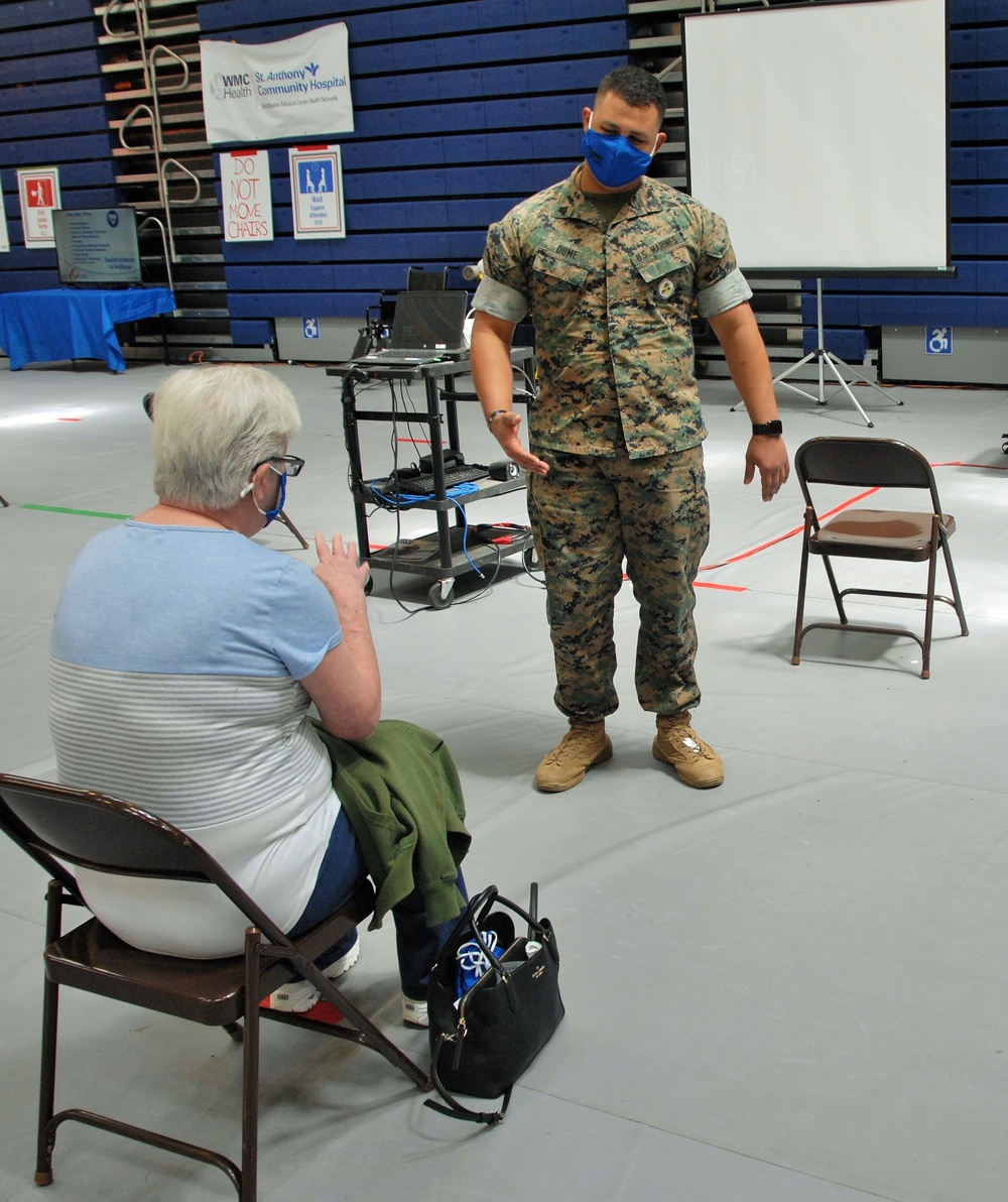 NY Guard members man vax site at Orange County Community College