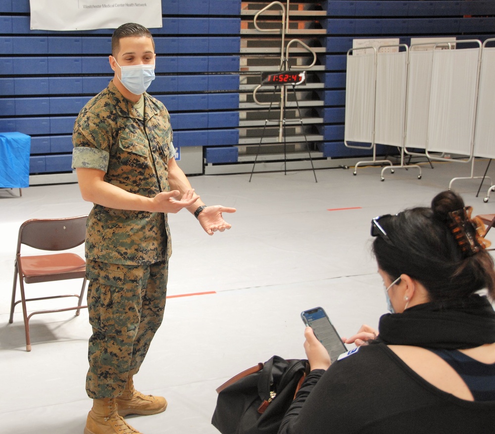 NY Guard members man vax site at Orange County Community College