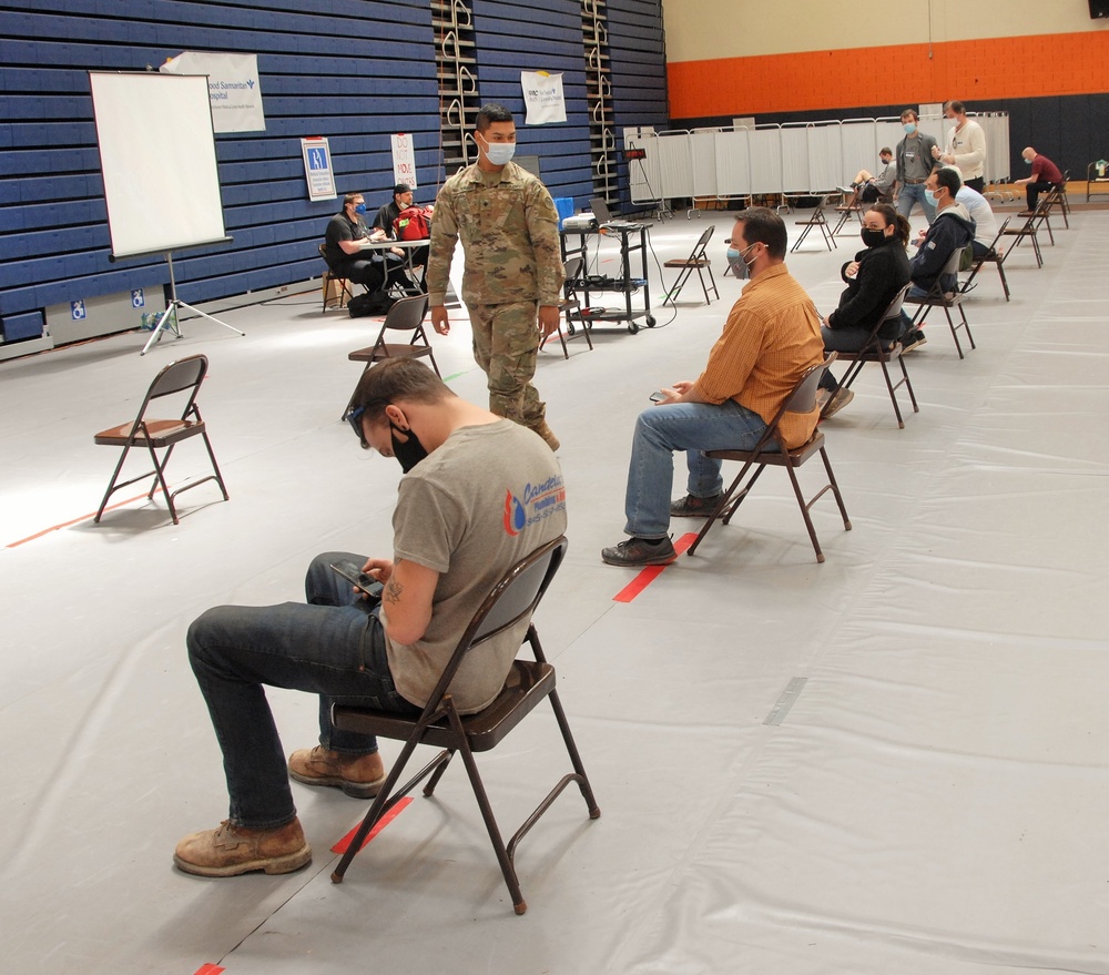 NY Guard members man vax site at Orange County Community College