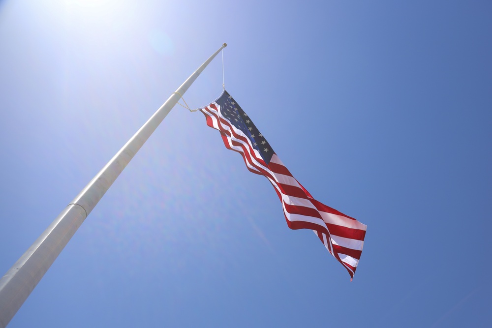 NCO of the Quarter Raises Flag on new Flagpole