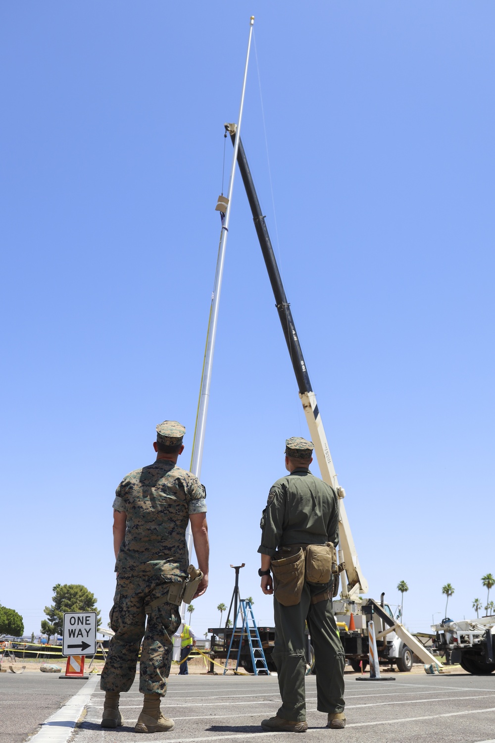 NCO of the Quarter Raises Flag on new Flagpole.