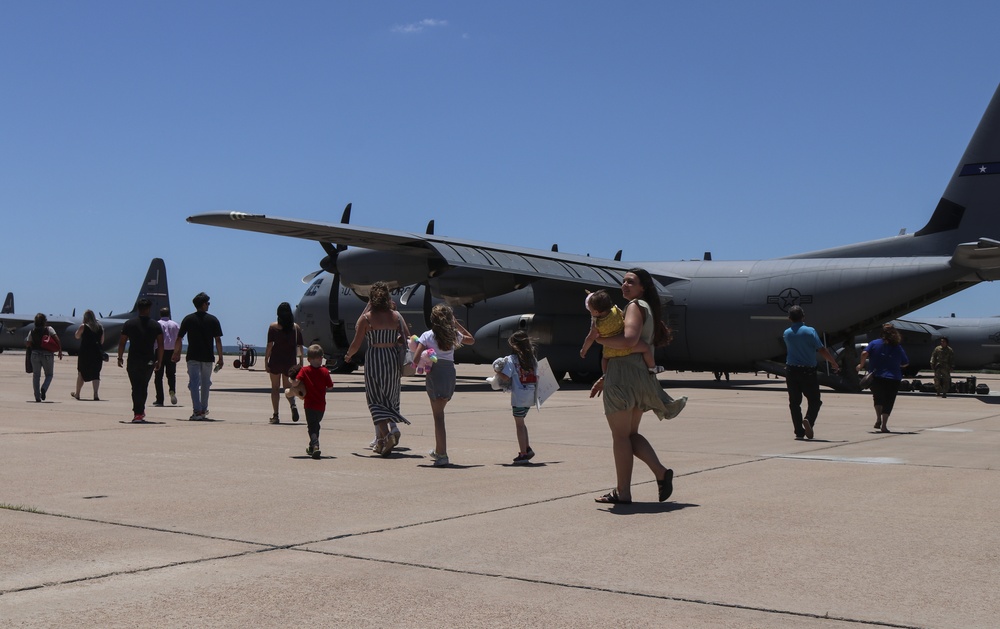 Families and Airmen welcome home 317th Airlift Wing members