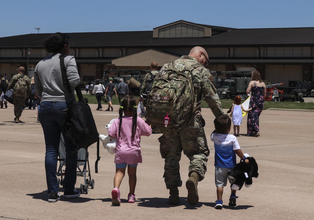 Families and Airmen welcome home 317th Airlift Wing members