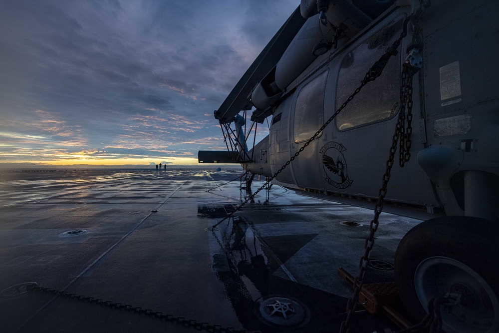 USS America steams into the sunset