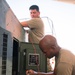 Task Force Phoenix mechanics from the 640th ASB at work