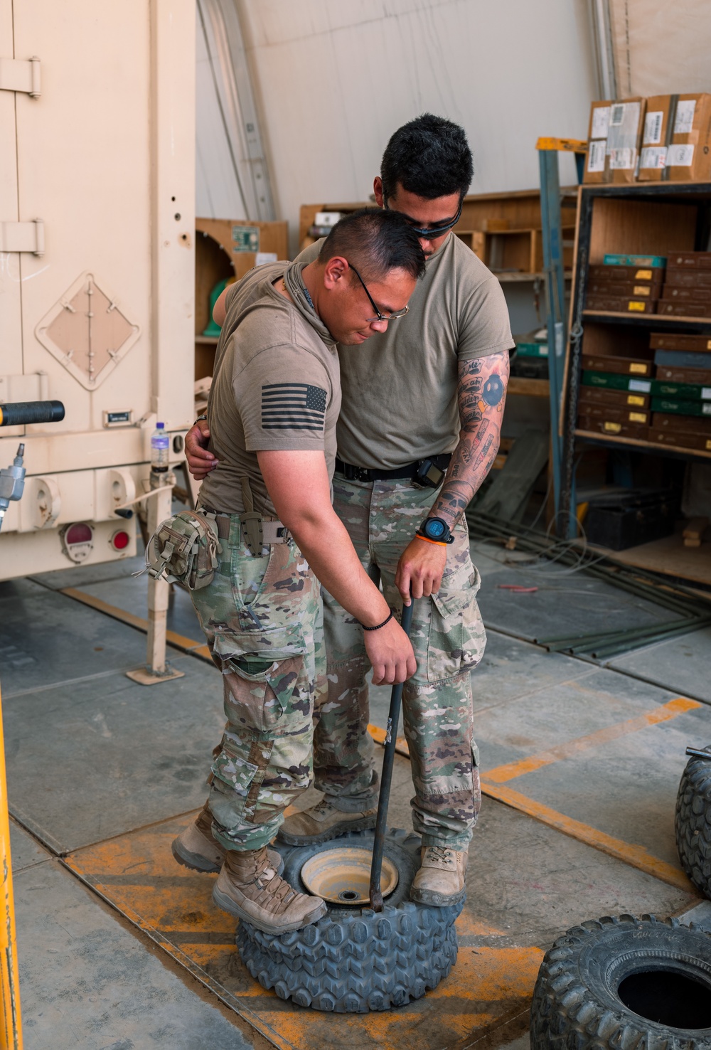 Task Force Phoenix mechanics from the 640th ASB at work