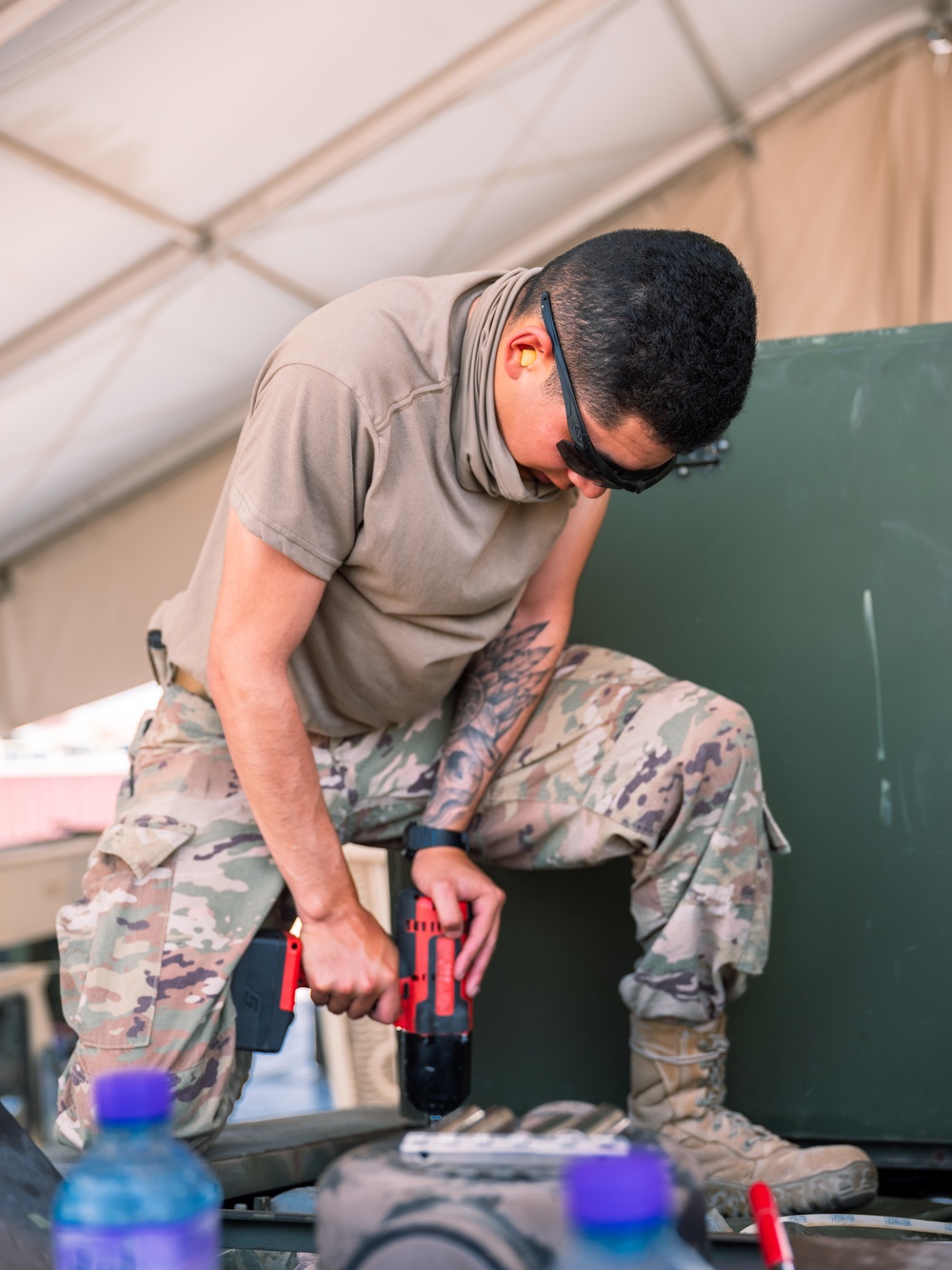 Task Force Phoenix mechanics from the 640th ASB at work