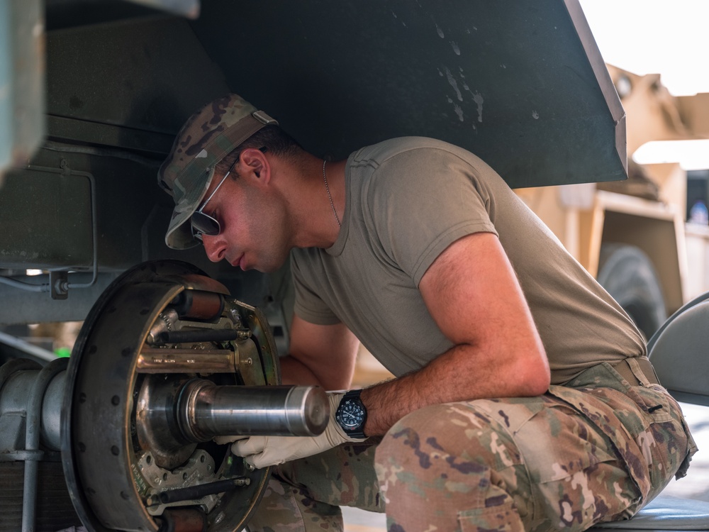 Task Force Phoenix mechanics from the 640th ASB at work