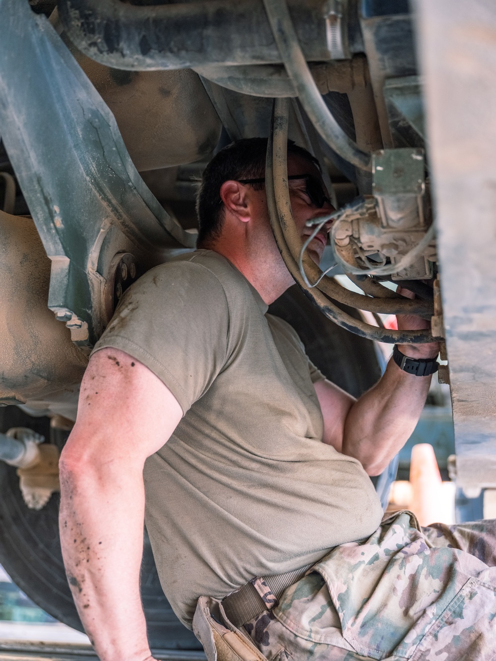 Task Force Phoenix mechanics from the 640th ASB at work