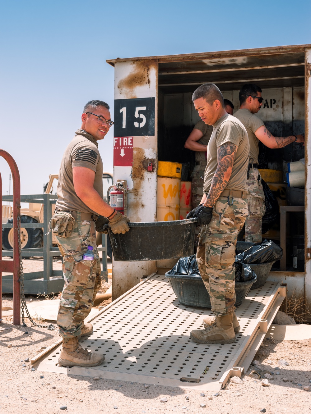 Task Force Phoenix mechanics from the 640th ASB at work