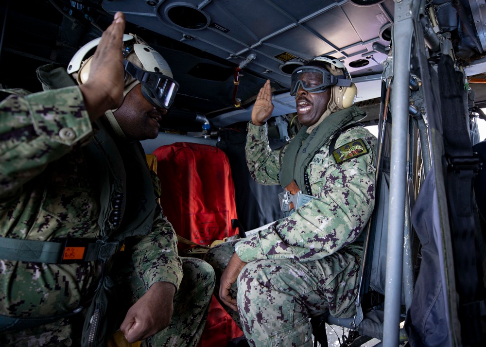 USS Sioux City Sailor Reenlists in Helicopter