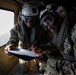 USS Sioux City Sailor Reenlists in Helicopter