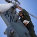 HSC 22 Sailor Prepares Helicopter for Flight