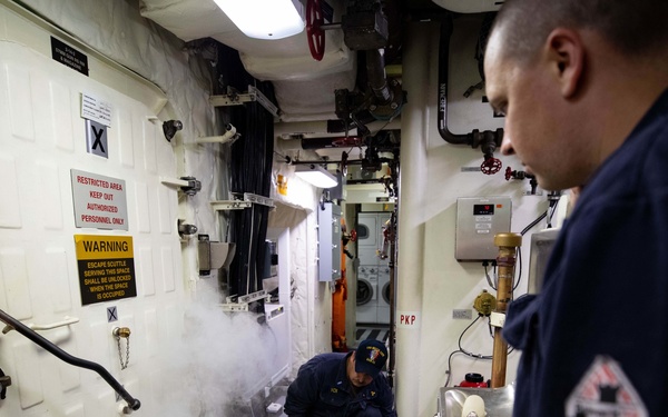 USS Sioux City Sailors Test Air Flow and Ventilation