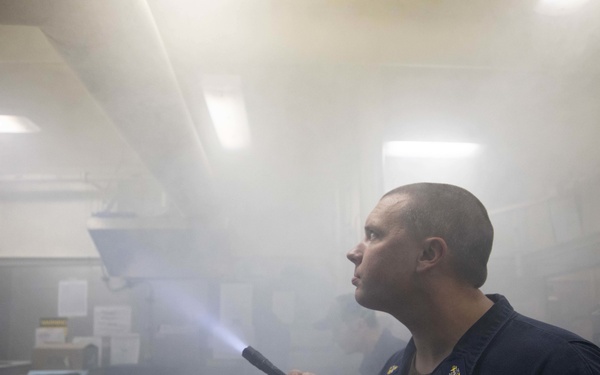 USS Sioux City Sailors Test Air Flow and Ventilation