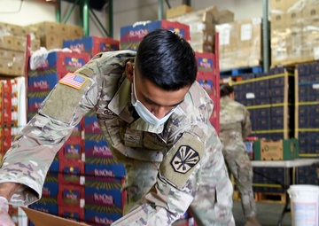 AZNG assists local food bank