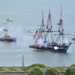 USS Constitution is tugged through the Boston harbor