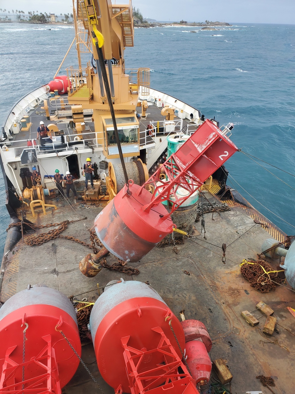 Coast Guard Cutter Willow services Aids to Navigation buoys in Puerto Rico ports