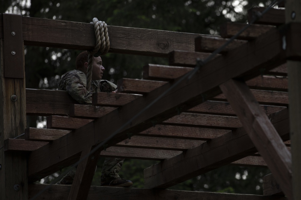 1st Special Forces Group Soldiers compete for Best Warrior Honors at an Obstacle Course