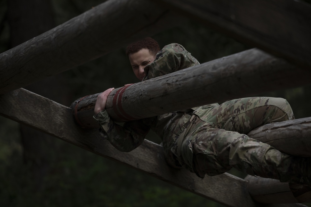 1st Special Forces Group Soldiers compete for Best Warrior Honors at an Obstacle Course