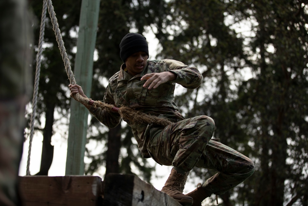 1st Special Forces Group Soldiers compete for Best Warrior Honors at an Obstacle Course