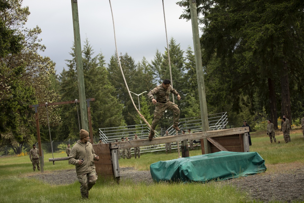 1st Special Forces Group Soldiers compete for Best Warrior Honors at an Obstacle Course