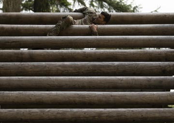 1st Special Forces Group Soldiers compete for Best Warrior Honors at an Obstacle Course