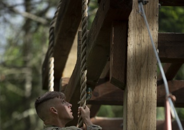 1st Special Forces Group Soldiers compete for Best Warrior Honors at an Obstacle Course