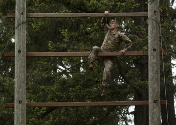 1st Special Forces Group Soldiers compete for Best Warrior Honors at an Obstacle Course