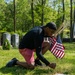 U.S. Navy Sailors honor veterans with gravesite flags