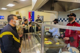 Born steps into the kitchen, serves Soldiers' breakfast