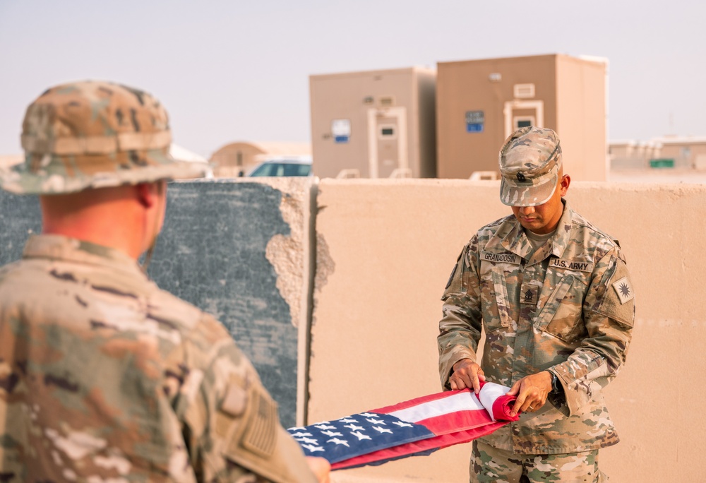 Task Force Phoenix 640th ASB lower the Colors at Retreat