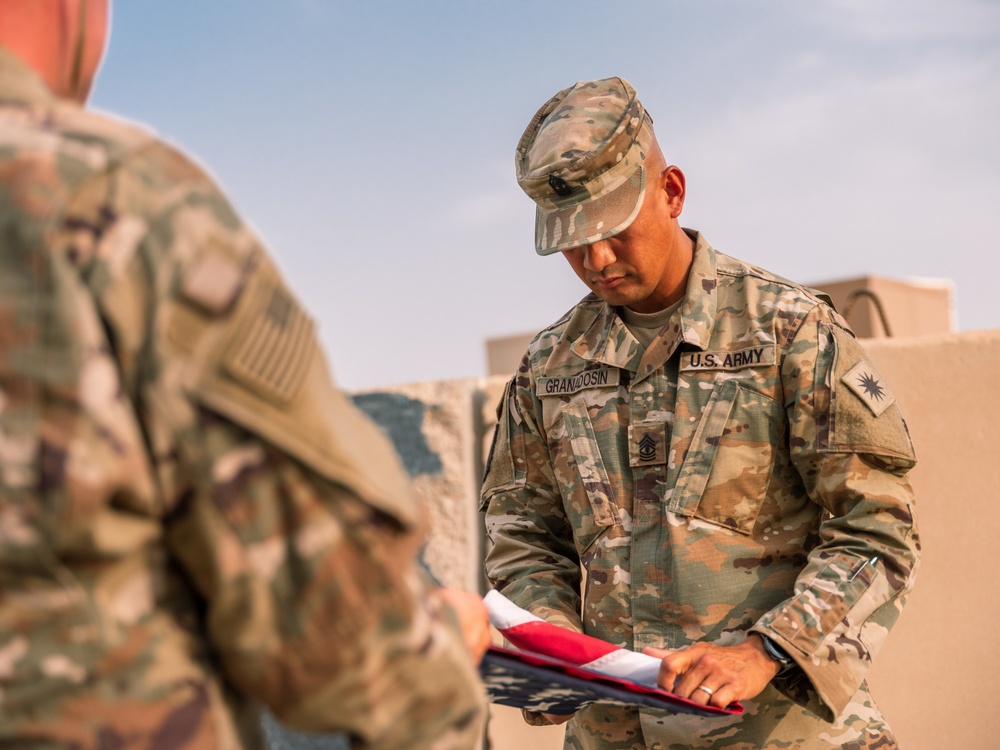 Task Force Phoenix 640th ASB lower the Colors at Retreat